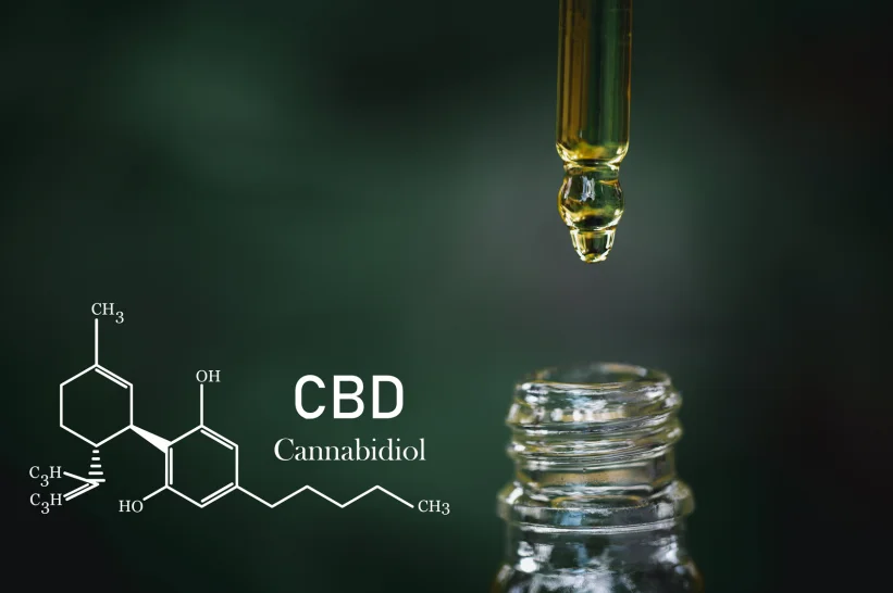 CBD chemical formula beside a tincture